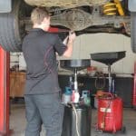 Working on bottom of car - Signature mechanical - mechanic gladstone