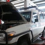 Car with hood open being serviced in workshop different angle @ Signature Mechanical Gladstone - Mechanic Gladstone
